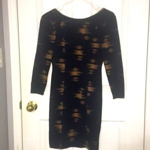 Aritzia black and orange stretch dress with swoop back, size small. Like new.